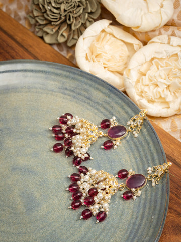 Garnet Jhumka gold earrings with deep garnet wine bead drops, by Luxani