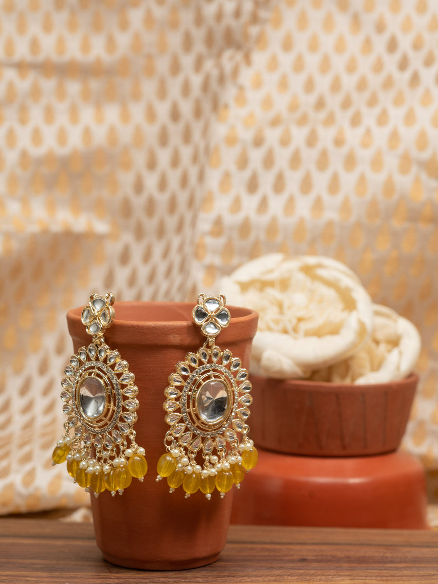 Saffron Crescent kundan chandbali earrings with warm saffron yellow bead drops, by Luxani