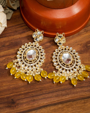 Saffron Crescent kundan chandbali earrings with warm saffron yellow bead drops, by Luxani