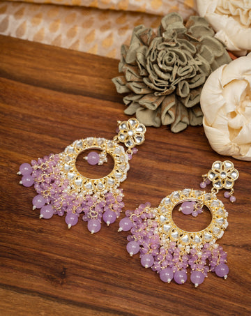 Lilac Crescent kundan chandbali earrings with soft lavender bead drops, by Luxani